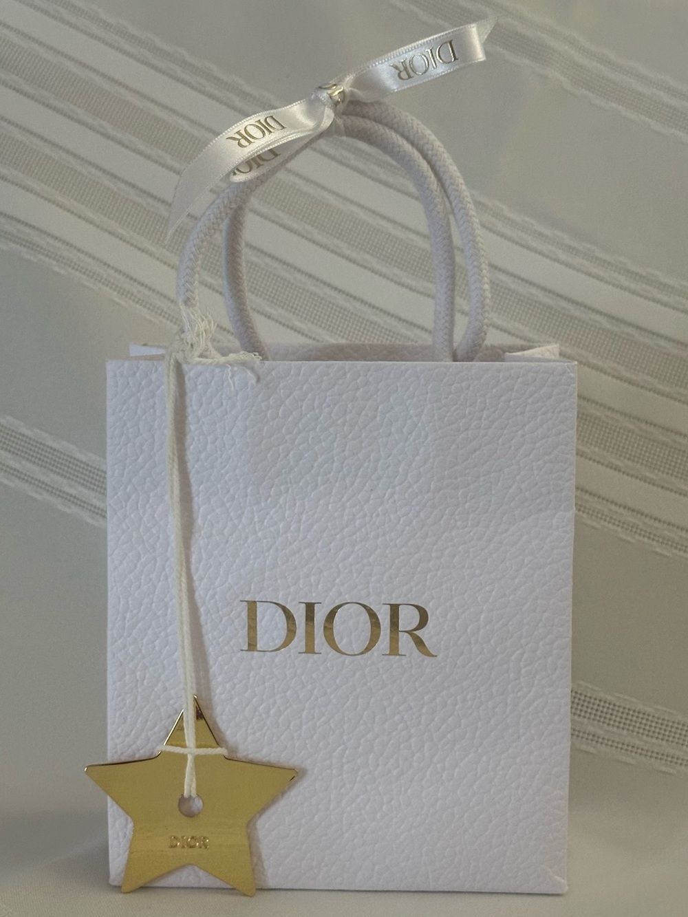 Dior White Mini Gift Bag with Gold Star Charm and Ribbon